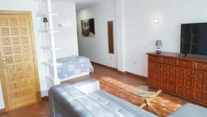 TV a/nebo společenská místnost v ubytování Apartamento amplio y tranquilo con vistas