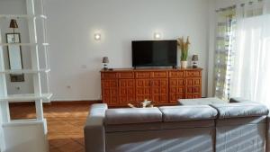 TV a/nebo společenská místnost v ubytování Apartamento amplio y tranquilo con vistas