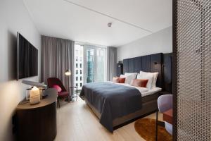 Postel nebo postele na pokoji v ubytování Clarion Hotel Oslo