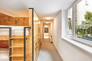 Vuode tai vuoteita majoituspaikassa H+ Hotel Wien