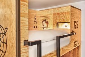 Vuode tai vuoteita majoituspaikassa H+ Hotel Wien