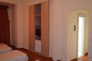 Postel nebo postele na pokoji v ubytování Lux Hotel