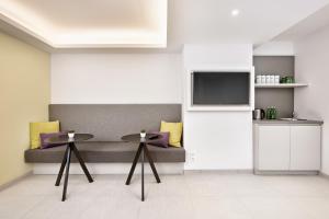 Majoituspaikan H+ Hotel Wien keittiö tai keittotila