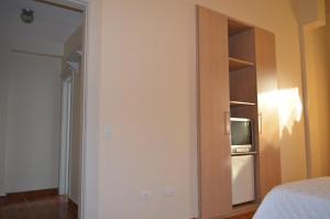 Kuchyň nebo kuchyňský kout v ubytování Lux Hotel