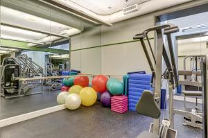 a gym with a bunch of balls on the floor at The Woods: Townhouse-F3 in Killington