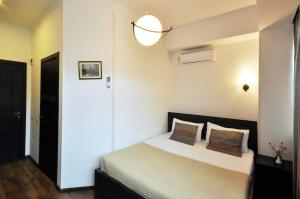 Ein Bett oder Betten in einem Zimmer der Unterkunft Tbilisi Check In