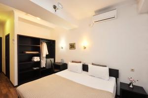 Ein Bett oder Betten in einem Zimmer der Unterkunft Tbilisi Check In