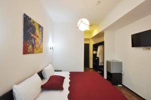 Ein Bett oder Betten in einem Zimmer der Unterkunft Tbilisi Check In