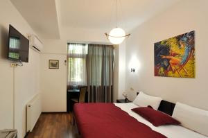 Ein Bett oder Betten in einem Zimmer der Unterkunft Tbilisi Check In