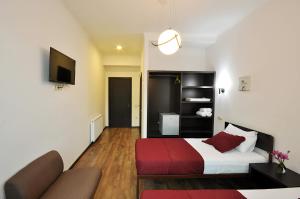 Ein Bett oder Betten in einem Zimmer der Unterkunft Tbilisi Check In