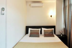 Ein Bett oder Betten in einem Zimmer der Unterkunft Tbilisi Check In
