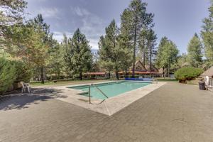 an image of a swimming pool in a yard at Circle 4 Ranch 25 | Discover Sunriver in Sunriver