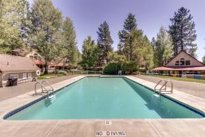 a swimming pool with a no diving sign in the middle at Circle 4 Ranch 31 | Discover Sunriver in Sunriver