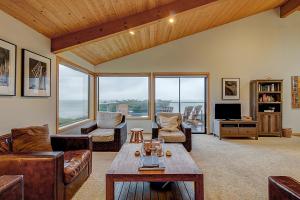 a living room with couches and a coffee table at Brammer's Bluff in Sea Ranch