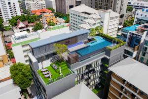 an overhead view of a building with a swimming pool at XQ Pattaya Hotel in Pattaya Central