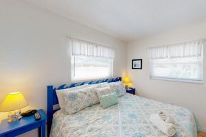 Postel nebo postele na pokoji v ubytování Blue Wave Villa East + 34 fotografií