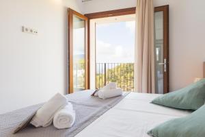 A bed or beds in a room at Can jordi Még 29 kép