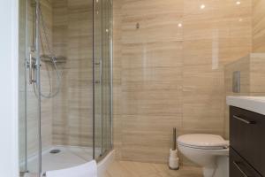 Koupelna v ubytování Apartament Na Urlop - Wisła Kamienna - Apartamenty z widokiem na panoramę Wisły + 18 fotografií
