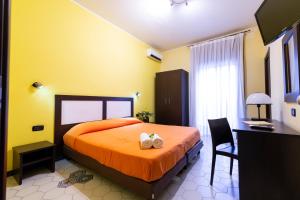 Postel nebo postele na pokoji v ubytování Hotel del Sole