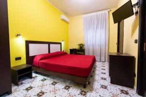 Postel nebo postele na pokoji v ubytování Hotel del Sole