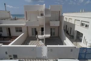 Φωτογραφία από το άλμπουμ του Baia Azzurra B&B σε Torre Lapillo +35 φωτογραφίες