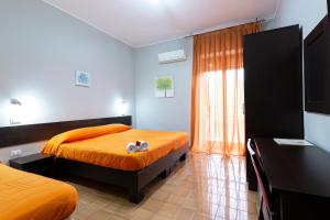 Postel nebo postele na pokoji v ubytování Hotel del Sole