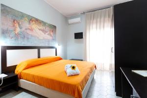 Postel nebo postele na pokoji v ubytování Hotel del Sole