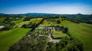 an aerial view of a farm in a green field at La Sorgente in Capannoli
