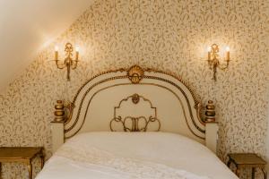 Postel nebo postele na pokoji v ubytování Jungshoved Præstegård B&B
