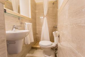 Koupelna v ubytování Hapi Hotel