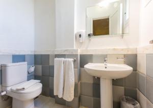 Koupelna v ubytování Hapi Hotel