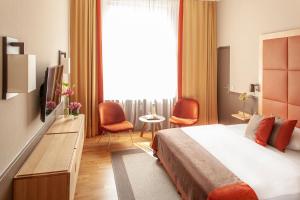 Postel nebo postele na pokoji v ubytování Hotel Elba am Kurfürstendamm - Design Chambers