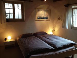 Voodi või voodid majutusasutuse Guesthouse Les Mignardises toas