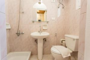 Koupelna v ubytování Hapi Hotel