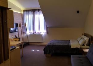 TV a/nebo společenská místnost v ubytování New Gudauri Suites