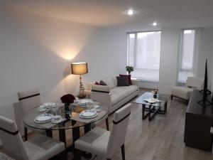 Et opholdsområde på Foresta Boutique Apartments