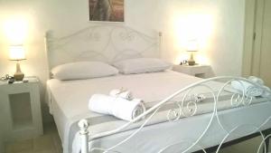 Кровать или кровати в номере A CASA NOSCIA - BB SAN PIETRO IN BEVAGNA Charming house