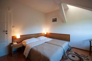 Letto o letti in una camera di Art Deco Hotel Hoffmann