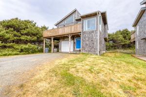 an image of a house with a driveway at Sweet Dream MCA #155 in Manzanita