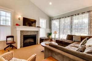 a living room with a couch and a fireplace at Bonnie Dune in Manzanita