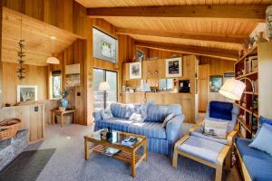 a living room with a couch and a table at Prentiss Retreat in Sea Ranch