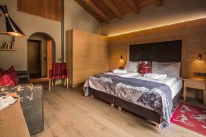 Voodi või voodid majutusasutuse Hotel Marmolada toas
