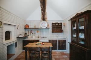 Kuchyň nebo kuchyňský kout v ubytování Trulli d'Itria