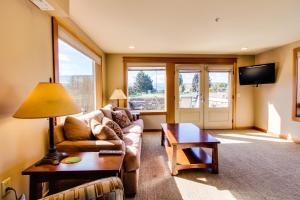 a living room with a couch and a table at Cabana #1 in Chelan