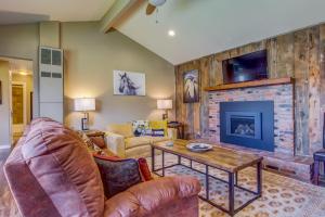 a living room with a couch and a fireplace at La Plata View in Durango