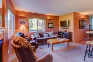 a living room with a couch and a table at Solano Vallejo 3349 in Moab