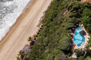 an aerial view of a beach and the ocean at Hotel Ponta do Madeiro in Pipa