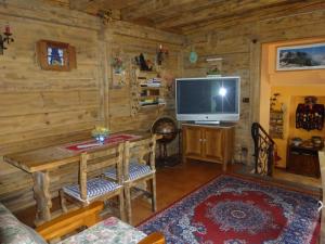 TV a/nebo společenská místnost v ubytování Hotel Genzianella