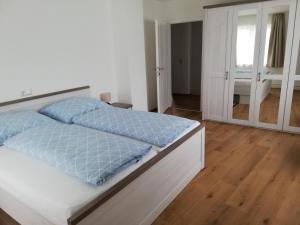 Łóżko lub łóżka w pokoju w obiekcie Ferienwohnung Schmied 3