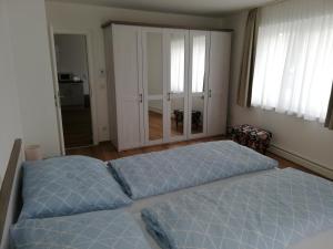 Łóżko lub łóżka w pokoju w obiekcie Ferienwohnung Schmied 3